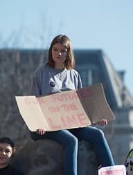Person holding sign